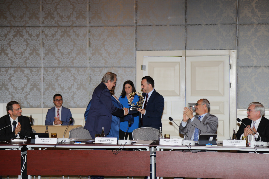 Chairman of the Board of Governors Bulent Aksu received our traditional olive wreath at the end of his Chairmanship term