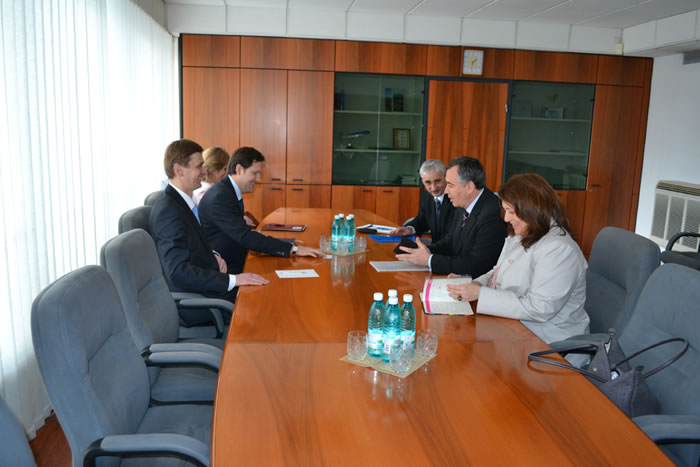 Meeting with Mr. D. Dragutanu, Governor (first on the left) and Mr. M. Molosag, Deputy Governor (second on the left) of the National Bank of Moldova.