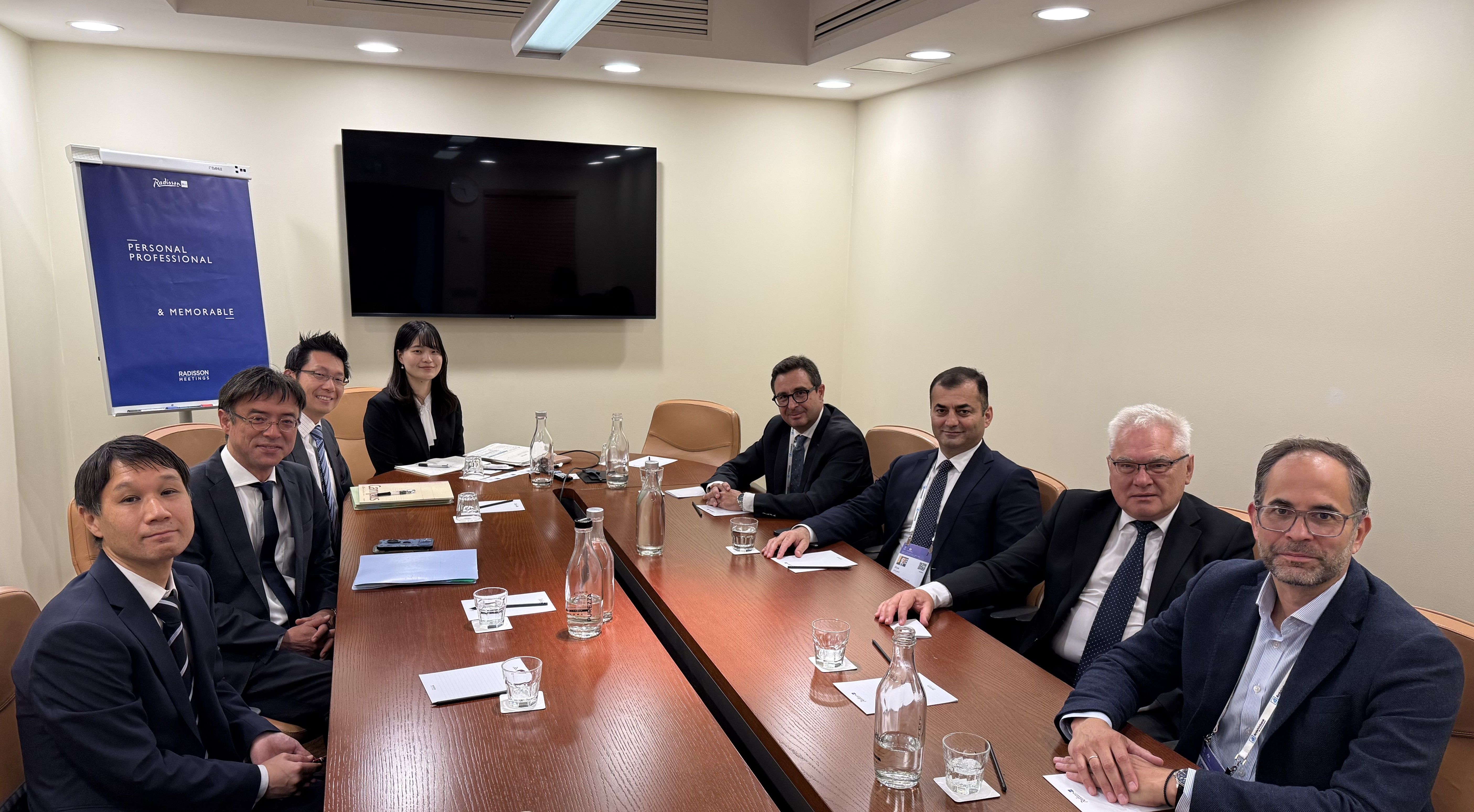 BSTDB representatives and counterparts pose for a group photo around a conference table during a bilateral meeting held on the sidelines of the EBRD 2026 Annual Meeting and Business Forum in Riga, Latvia.