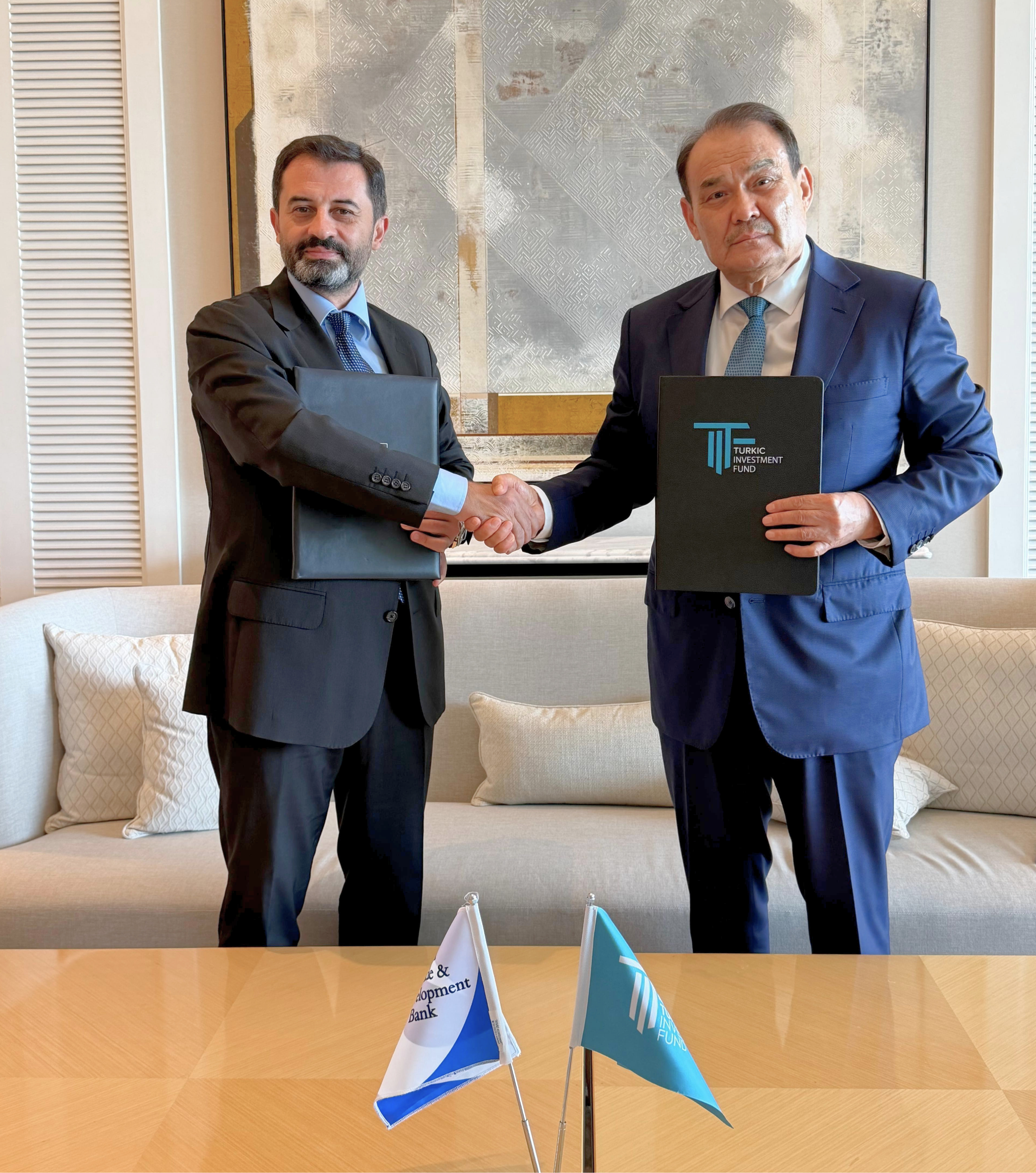 BSTDB President Dr. Serhat Köksal and TIF President Baghdad Amreyev during the MoU signing.