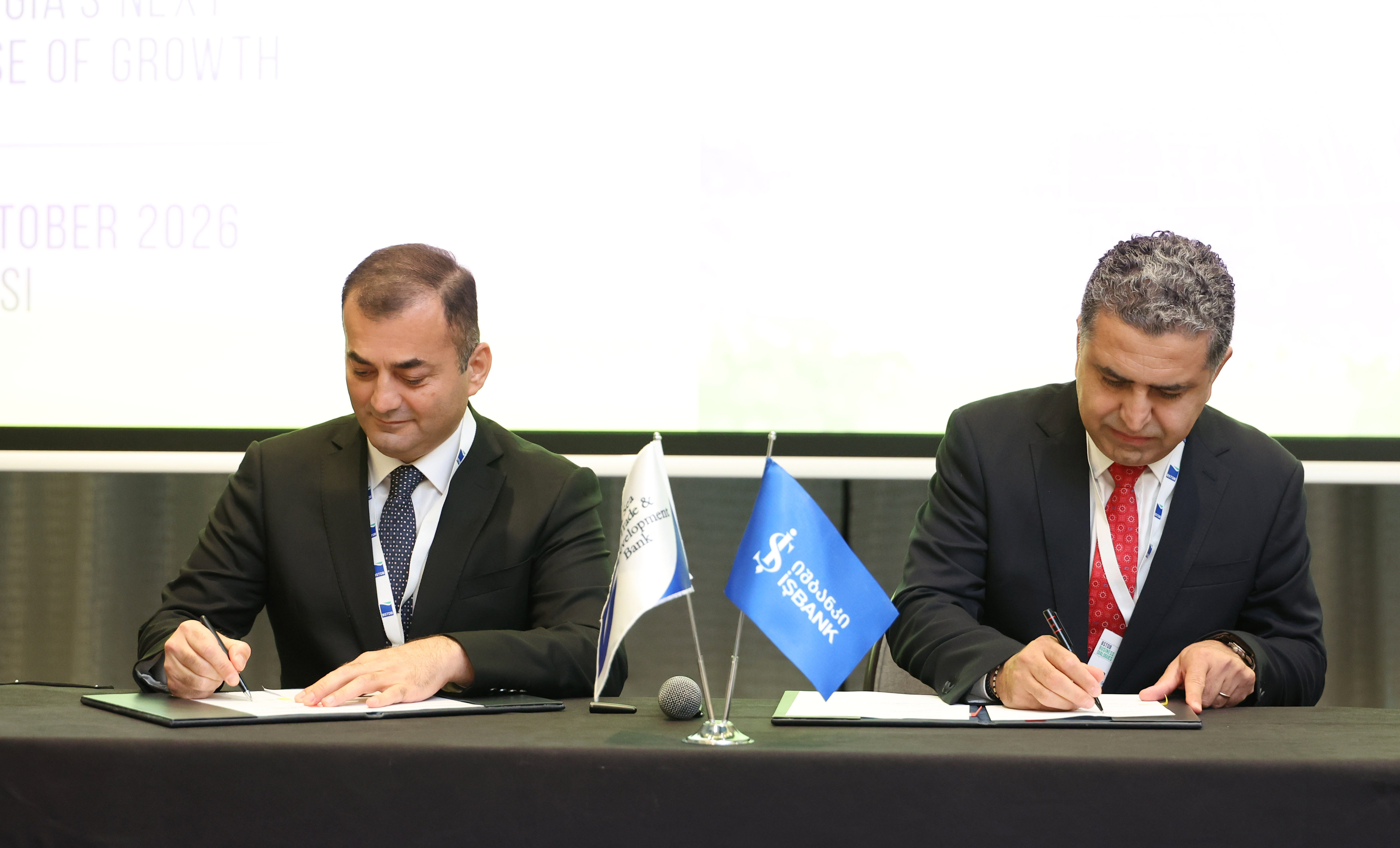 BSTDB Vice President Banking Ziya Aliyev and Isbank Georgia CEO Onur Kutuk sign the EUR 7 million SME financing agreement in Tbilisi.